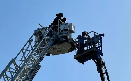 PHOTOS: Colonial Heights firefighters save workers trapped on stories-high lift