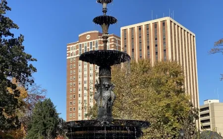 Holiday market, Christmas caroling taking place in Monroe Park in December