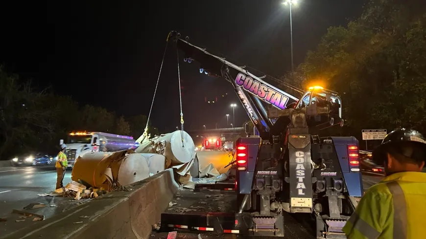 Tractor-trailer hauling industrial-sized paper overturns on I-95 in Richmond