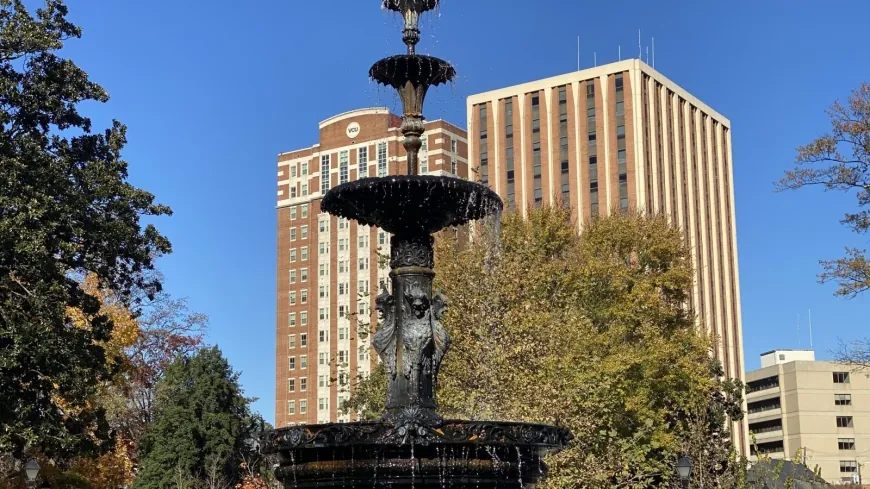 Holiday market, Christmas caroling taking place in Monroe Park in December