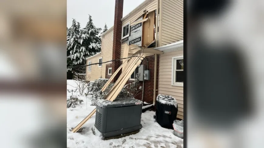 PHOTO: Downed power line pulls siding off house in Bon Air