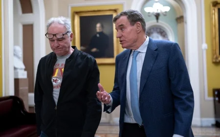 Kaine, Warner introduce bill to bar ICE agents from wearing masks