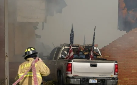 Gunman in truck smashes into Michigan church and opens fire, killing at least 4 and injuring 8