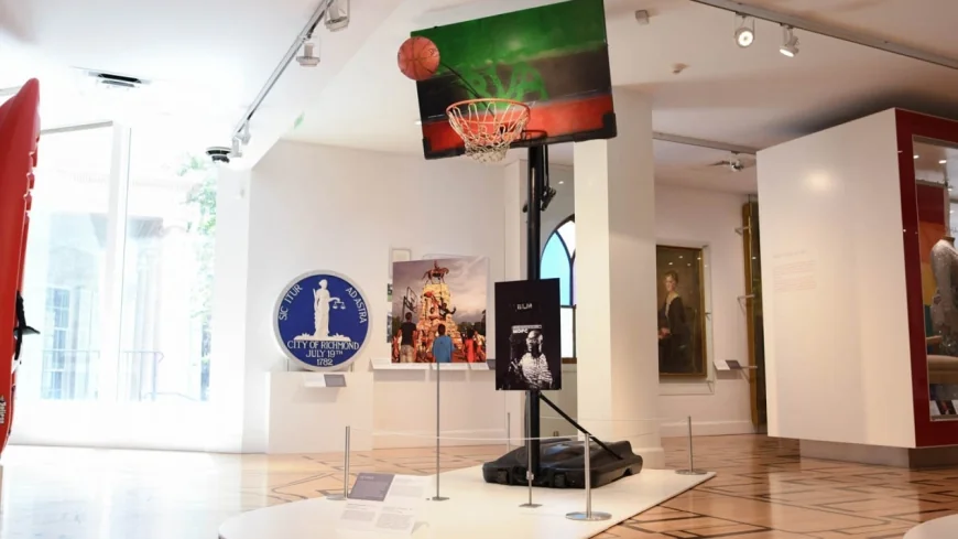 Basketball hoop, ball used at Lee Circle during summer 2020 on display at the Valentine